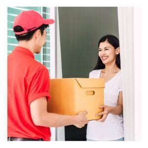 A customer happy with the delivery driver