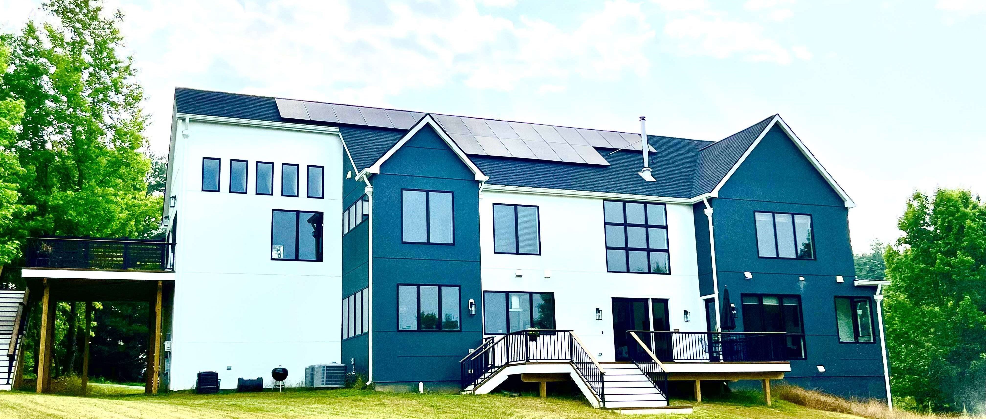 Energy-efficient home with solar panels.