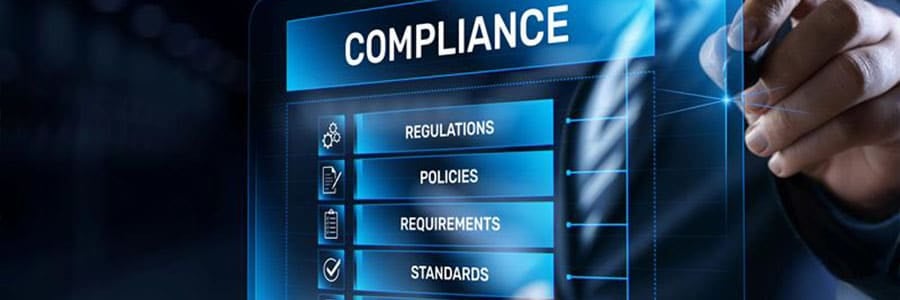 Business professional touching a digital screen showing compliance elements like regulations, policies, and standards, representing IT compliance.