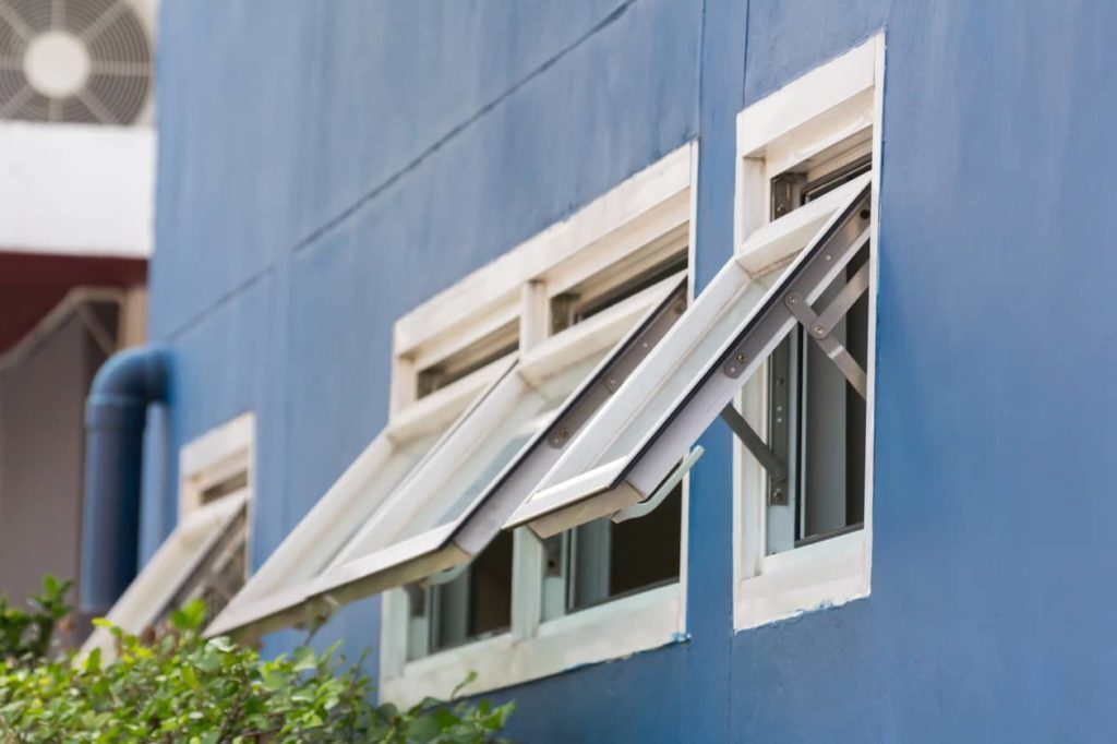 Multiple awning windows in a building. 