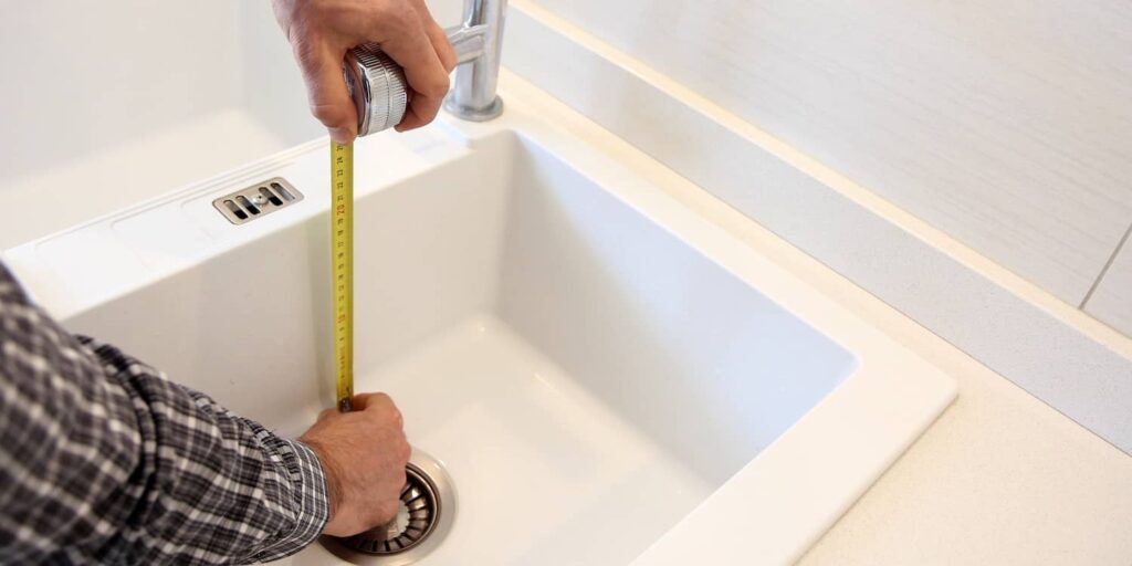Once you measure your kitchen sink's primary dimensions, you'll just need to conduct regular maintenance to keep it in shape. 