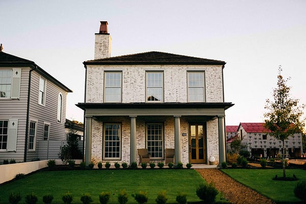 A beautiful limewash brick house with modern updates