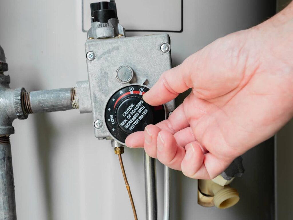 Simply adjust your thermostat to increase the water temperature on your water heater. 